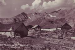 Alphütten auf dem Flimserstein mit Ringelgebirge (Tristelhorn, Glaserhorn und Ringelspitz), Poststempel vom 14.08.1937. Aufnahme und Verlag von Jules Geiger, Photohaus Flims-Waldhaus